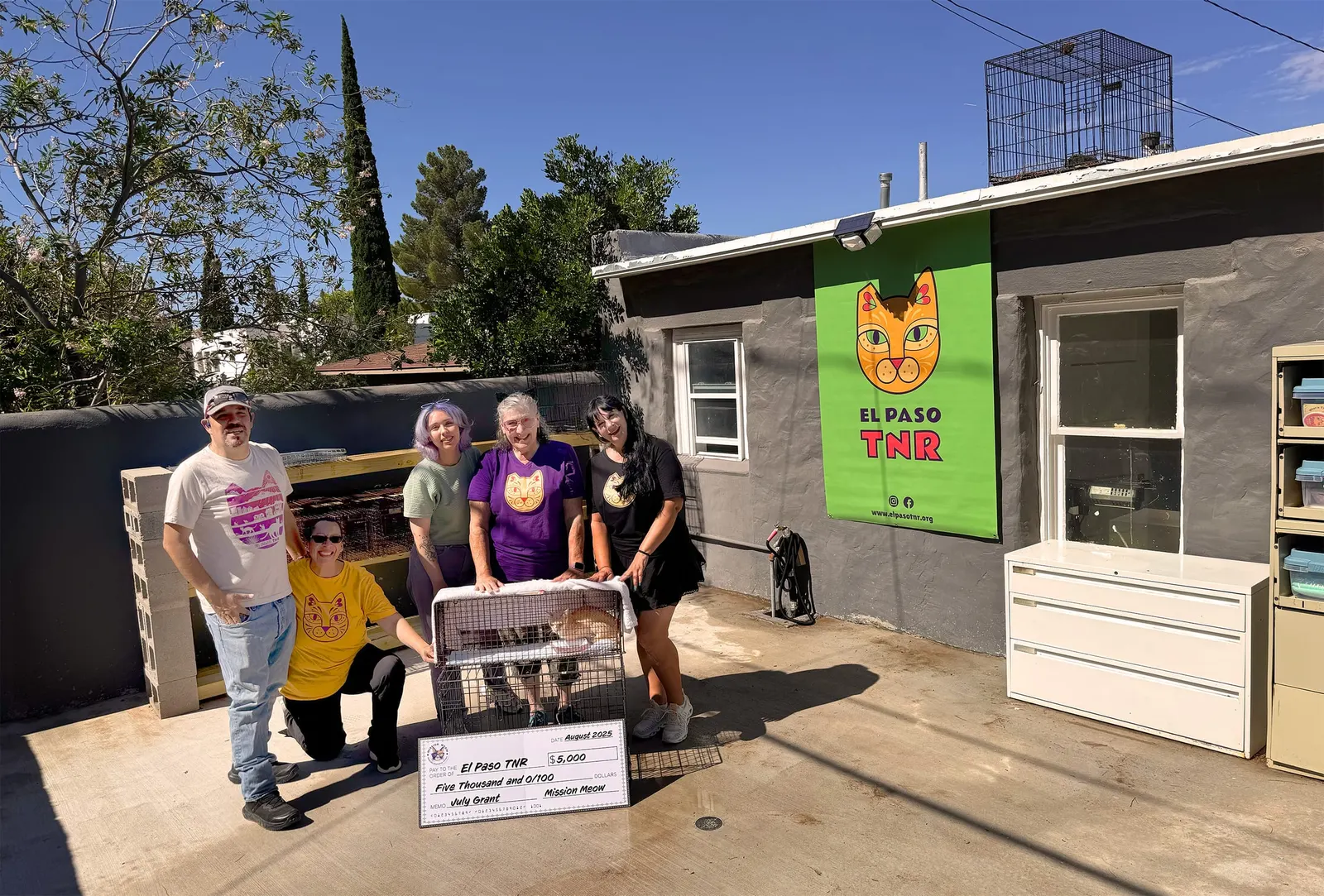 The El Paso TNR group with its check outside their cat facility