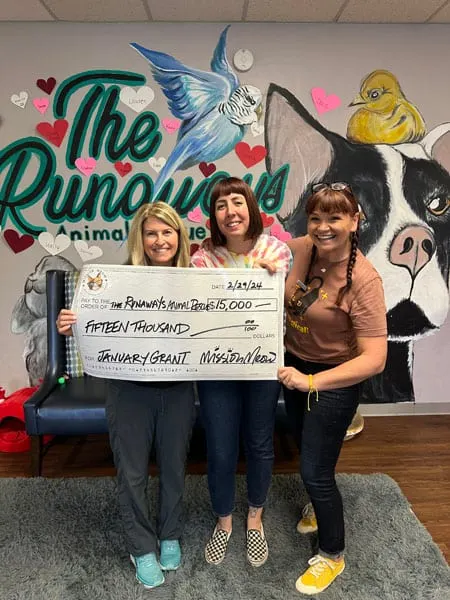 The Runaways Animal Rescue's Mission Meow grant check presentation
