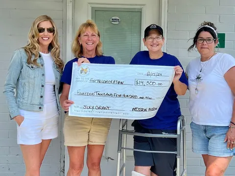 For the Love of a Paw's Mission Meow grant check presentation