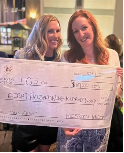 Firelands Community Cat Coalition's Mission Meow grant check presentation